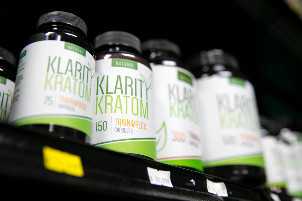 Klarity Kratom product lineup showing capsules and powder in green and white packaging with various strain options